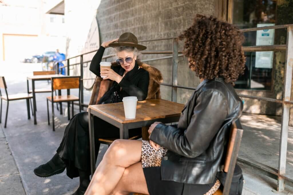 two women having coffee time